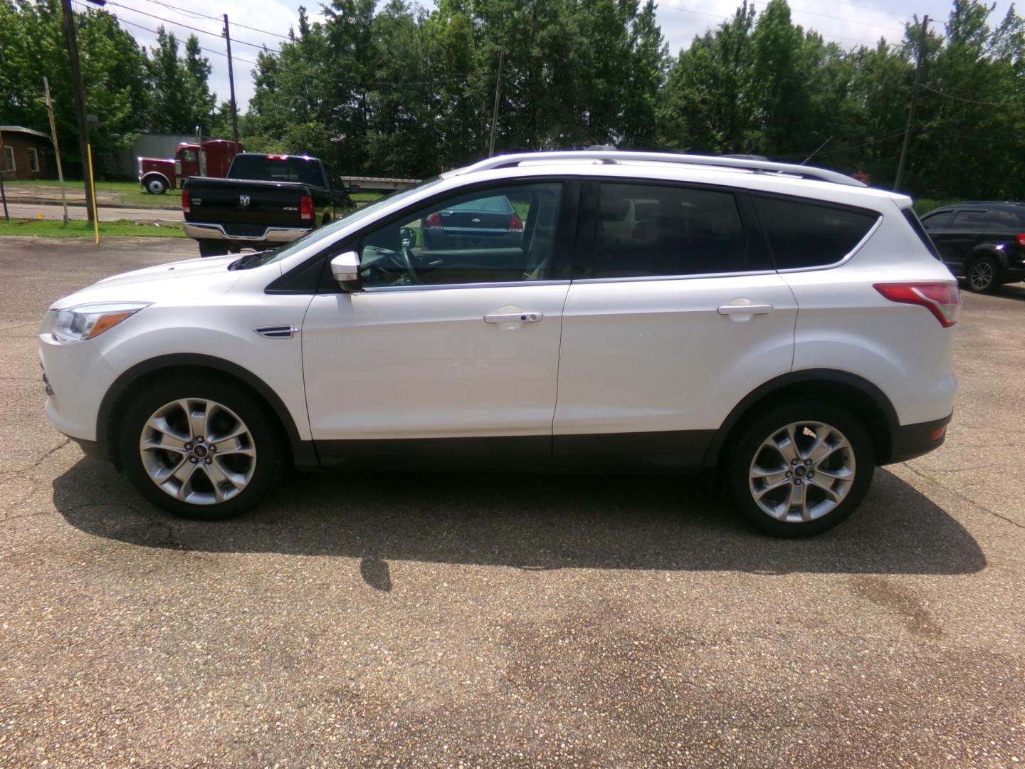 2015 White /Tan Ford Escape Titanium (1FMCU0JX9FU) with an 2.0L Ecoboost engine, automatic transmission, located at 401 First NE, Bearden, AR, 71720, (870) 687-3414, 33.726528, -92.611519 - Photo#1